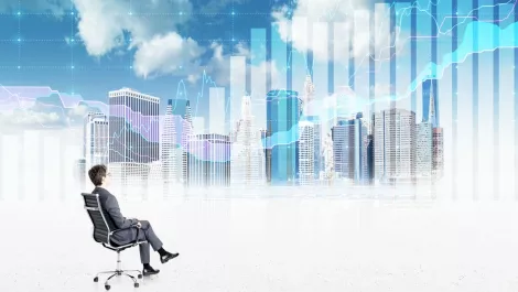 Businessman observing graphs