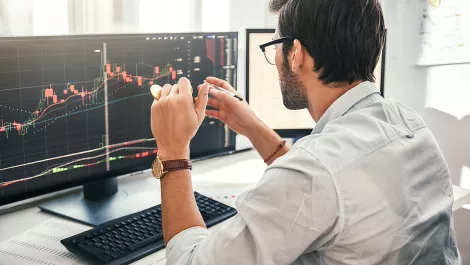 How has blockchain impacted the trading market?