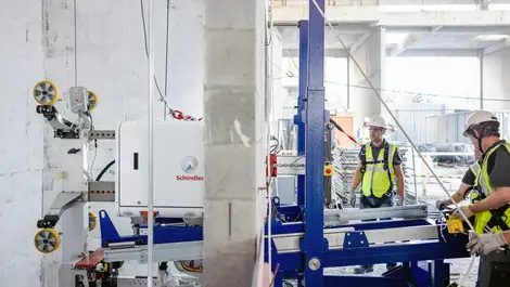 Schindler adds two more elevator shaft robots to fleet